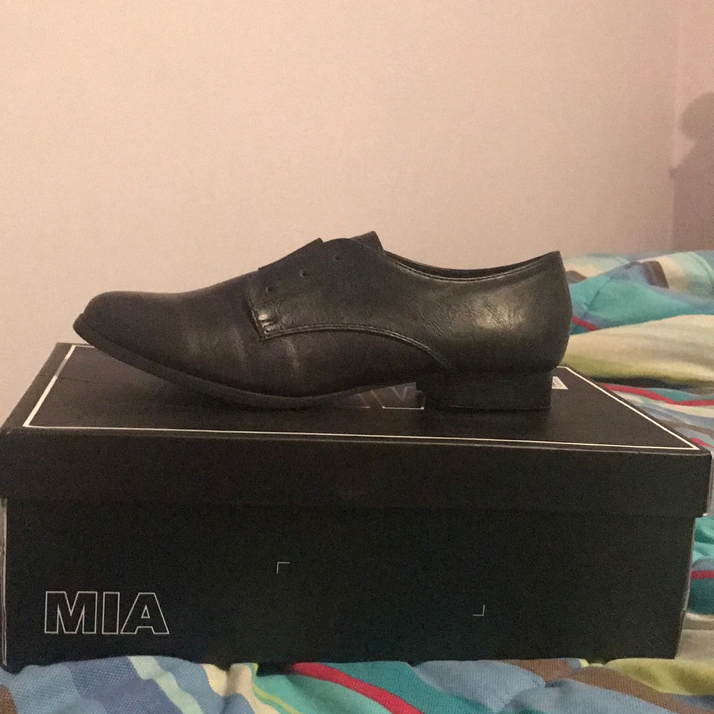 All black leather oxfords